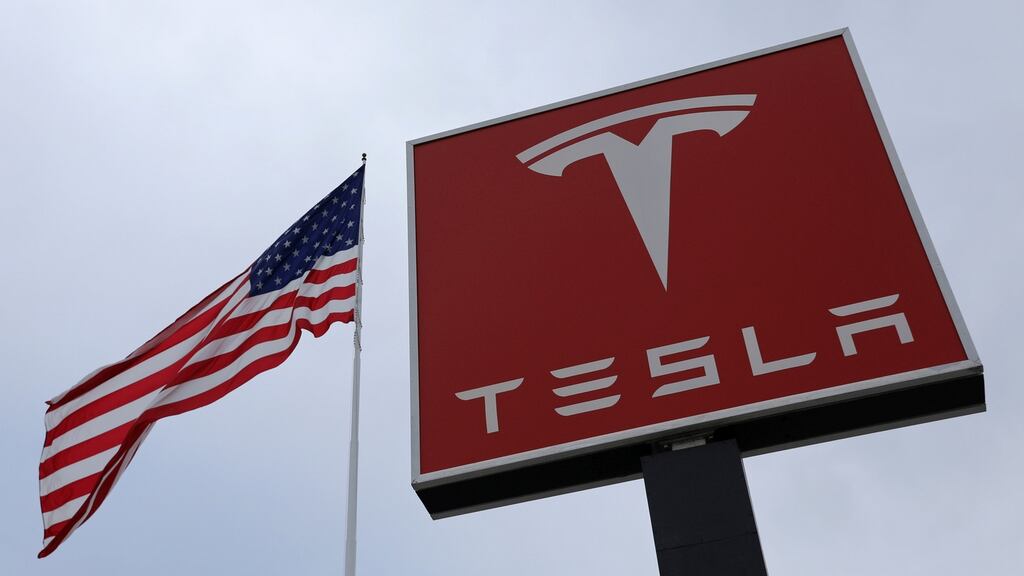 Tesla is reporting ahead of schedule, leading to speculation that it may post a profit. Photograph: Reuters