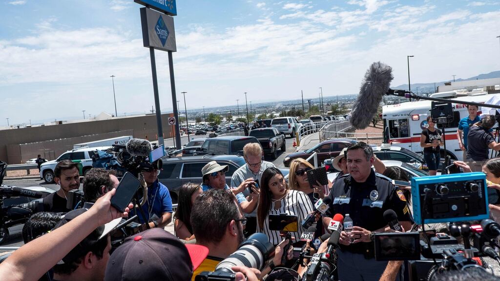 An El Paso police department official briefing media. ‘People were panicking and running, saying that there was a shooter. They were running close to the floor – people were dropping on the floor,’ an eyewitness said. Photograph: Joel Angel Juarez/AFP/Getty Images