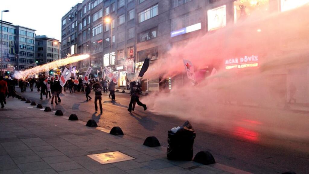 Turkish riot police clash with protestors during a demonstration for the victims of the Soma mine explosion, in Istanbul. Photograph:  EPA/Ulas Yunus Tosun