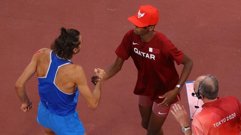 Italy’s Gianmarco Tamberi and Qatar’s Mutaz Essa Barshim shared the high jump gold medal. Photograph: Richard Heathcote/Getty