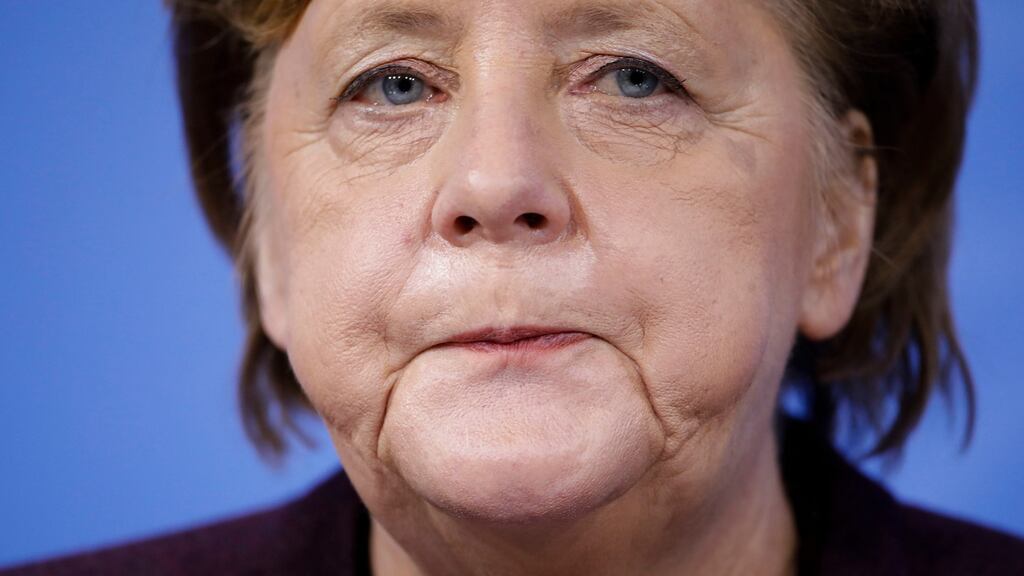 German chancellor Angela Merkel  met with German head of federal states to discuss extension of restrictions. Photograph: Markus Schreiber/AP Photo