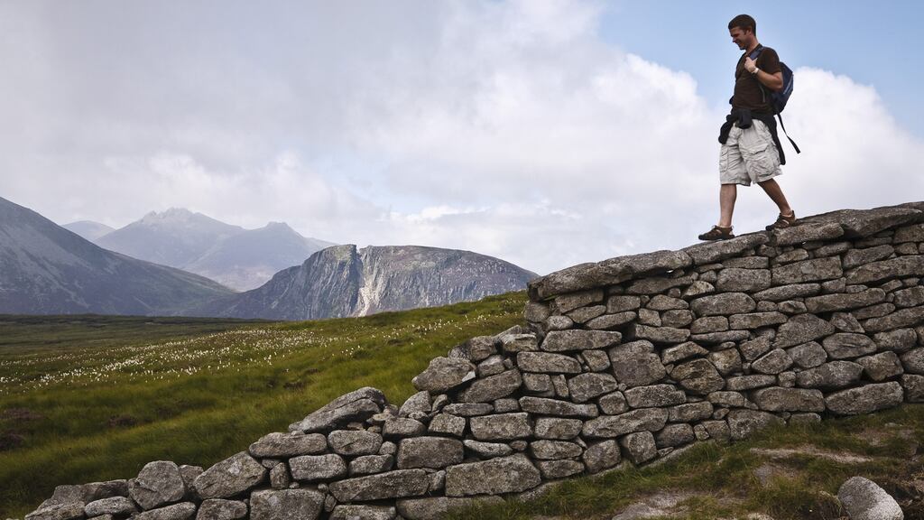 The drystone Mourne Wall, which snakes its way for 35km across the Mourne Mountains of south Down. Photograph: Getty Images