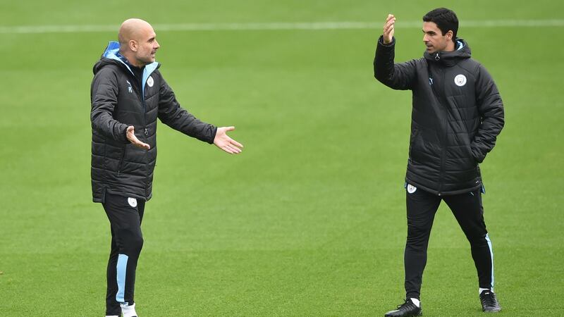 Pep Guardiola will meet former assistant Mikel Arteta on Wednesday night. Photograph: Nathan Stirk/Getty