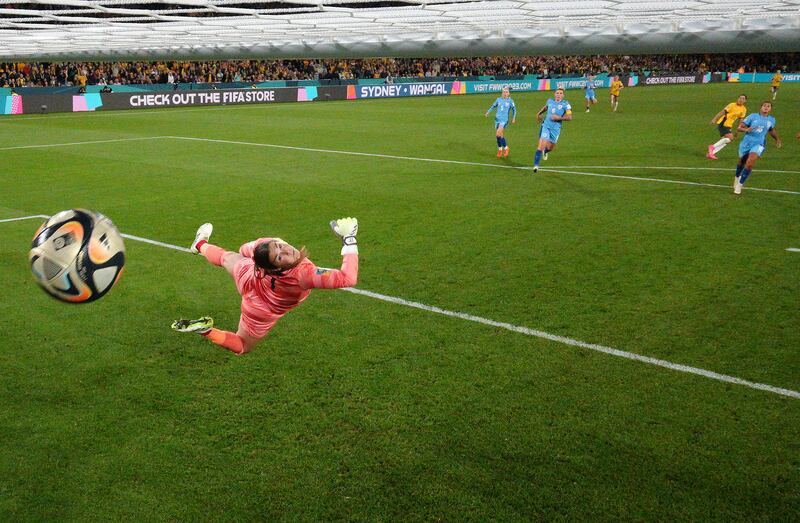 Mary Earps of England dives in vain as Australia's Sam Kerr scores. Photograph: Cameron Spencer/Getty