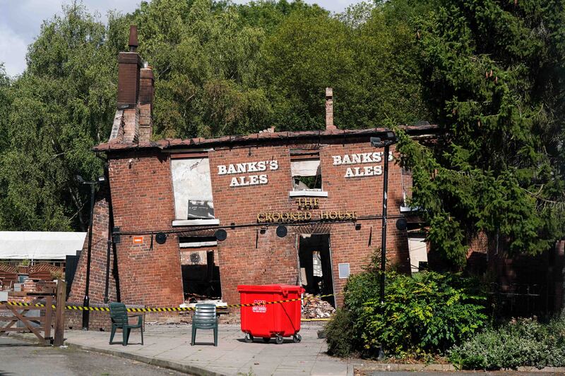 The Crooked House pub after it was burned down. Photograph: Jacob King/PA Wire