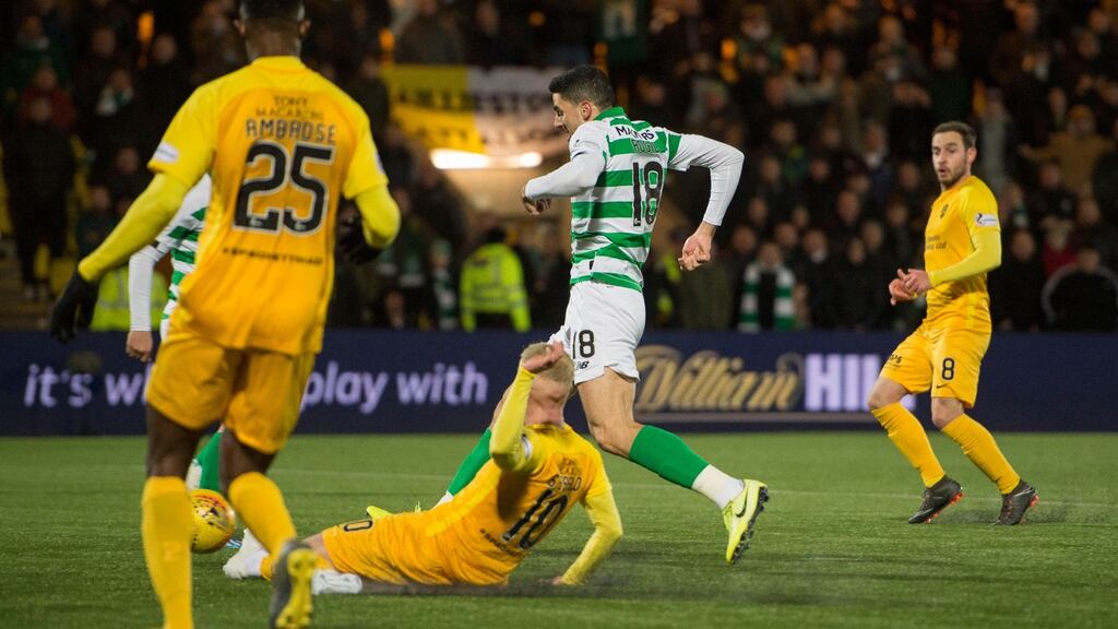 Celtic’s Tom Rogic scores a late goal at the Tony Macaroni Arena in Livingston. Photograph: PA