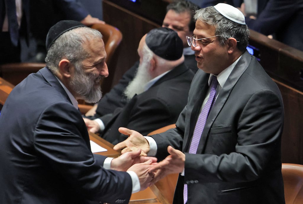 Arieh Deri, leader of the ultra-Orthodox Shas party, and Itamar Ben-Gvir, leader of the far-right Otzma Yehudit (Jewish Strength). Mr Deri has been convicted twice on corruption charges, while Mr Ben-Gvir has been convicted on numerous counts of disturbing the peace. Photograph: Gil Cohen-Magen/Getty Images