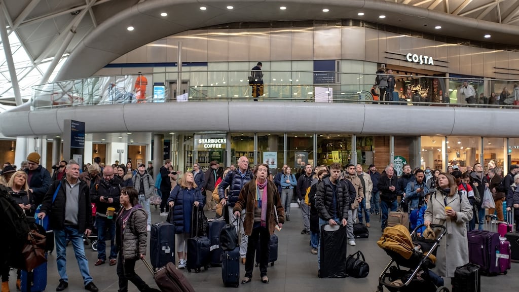 Travellers at Kings Cross rail station in London on Friday, March 13th, 2020. Photograph: Andrew Testa/The New York Times