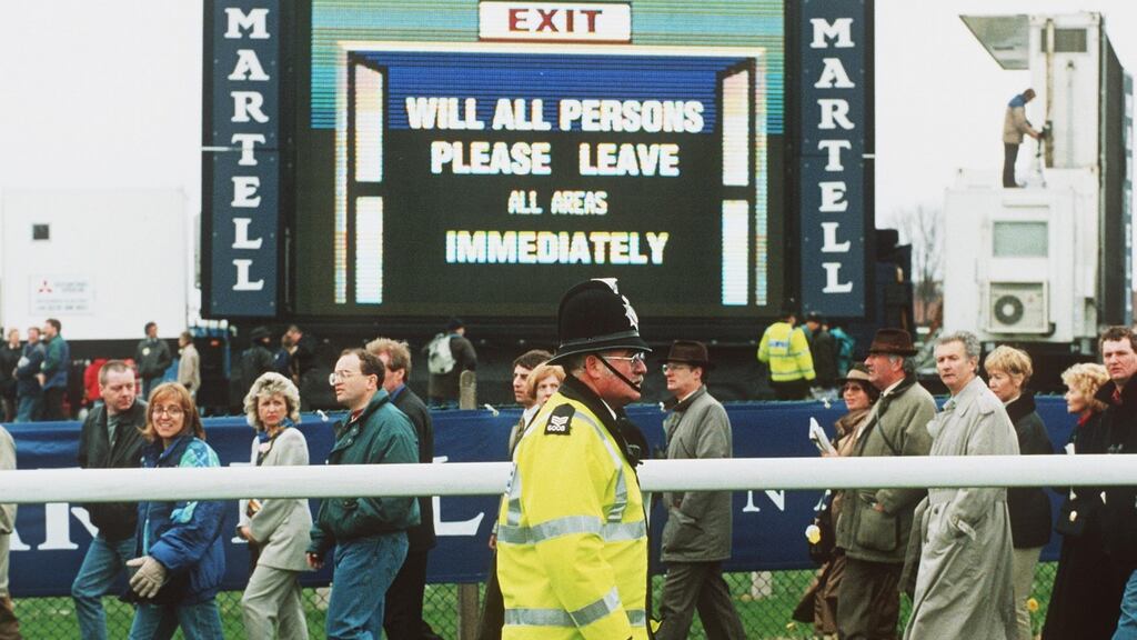 Racegoers leave Aintree after the 1997 Grand National was postponed due to a bomb scare. Photograph: Inpho/Allsport