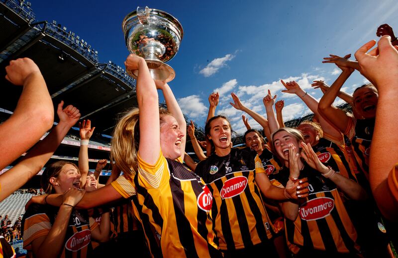 Kilkenny’s Aoife Prendergast holds aloft the O'Duffy Cup after their All-Ireland final win. Photograph: James Crombie/Inpho
