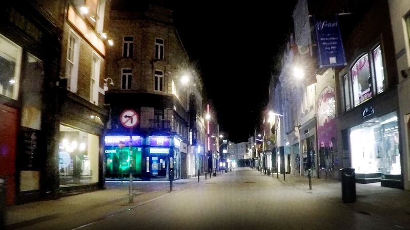 Henry Street in Dublin’s city centre on the first Friday night of lockdown. Photograph: Bryan O’Brien/The Irish Times.
