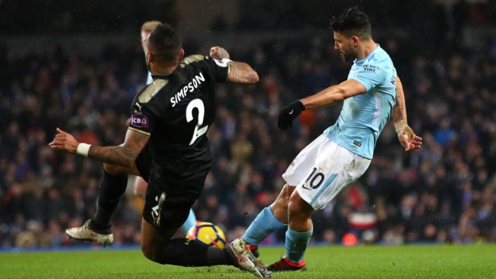 Sergio Agüero scores his fourth goal and Manchester City’s fifth during the Premier League game against Leicester City at the Etihad Stadium. Photograph: Clive Brunskill/Getty Images