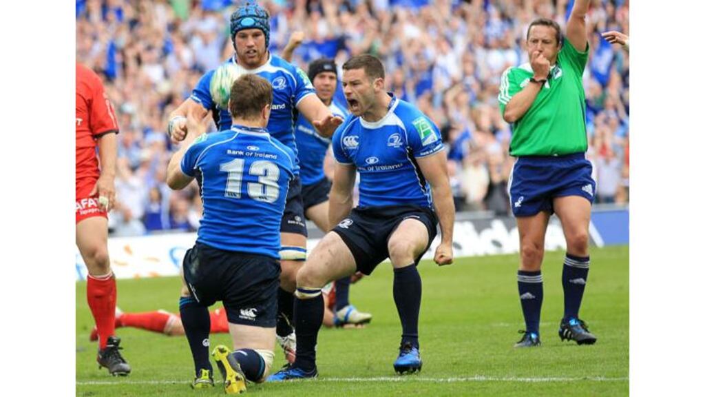 Fergus McFadden celebrates after Brian O'Driscoll scores a Leinster try during their Heineken Cup Semi-final win over Toulouse at the Aviva Stadium. Photograph: Billy Stickland/Inpho