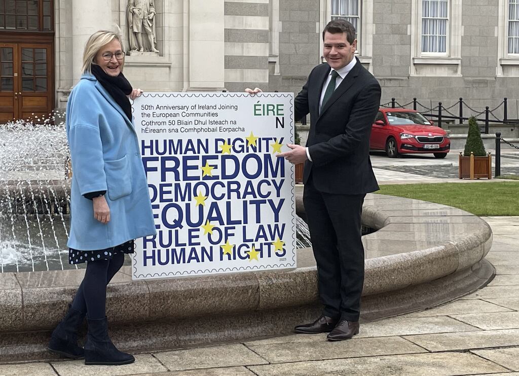 Ireland's EU Commissioner Mairead McGuinness and Minister of State for European Affairs Peter Burke unveil the first An Post stamp of 2023. Photograph: PA Wire