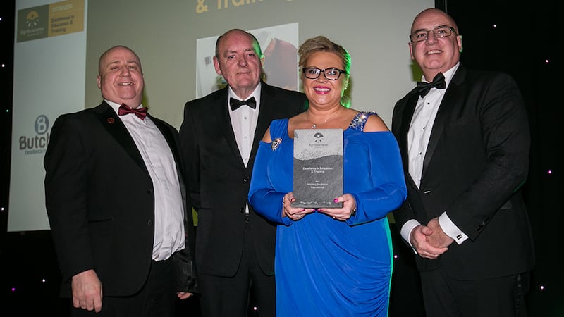 Denis O’Brien, Director of Standards & Solutions, GS1 Ireland, presents the Excellence in Education & Training award to Denis Lang, Sean Owen & Rhonda Montgomery, Butchery Excellence International