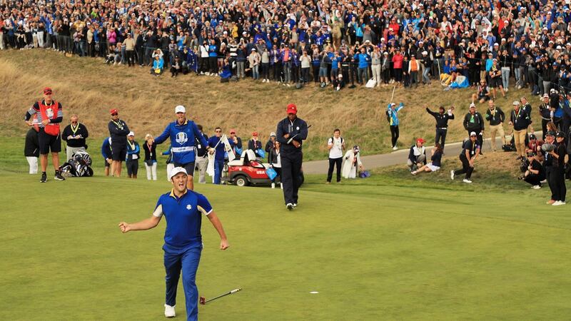 Jon Rahm celebrates winning his singles match against Tiger Woods at the Ryder Cup in Paris. Photograph: Mike Ehrmann/Getty Images