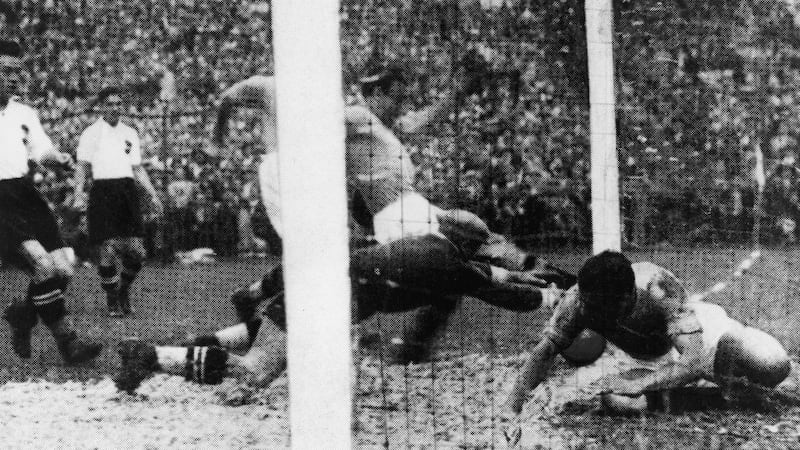 Italy’s Enrico Guaita scores the only goal of the 1934 World Cup final. Photograph: Keystone/Hulton Archive/Getty