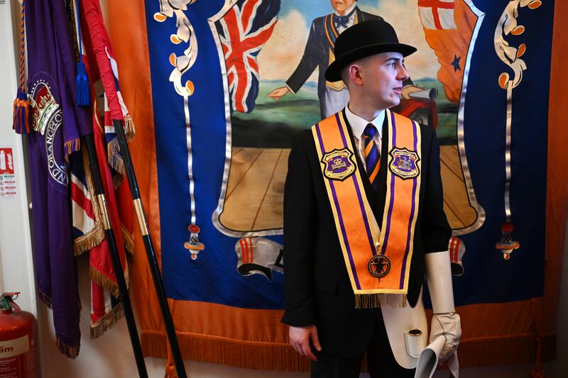 An Orangeman prepares to take part in the annual Twelfth of July parade in Belfast. Photograph: Charles McQuillan/Getty