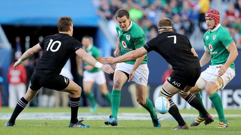 Ireland outhalf Johnny Sexton in action against Beauden Barrett and Sam Cane of new Zealand during the game at Soldier Field in Chicago in November 2016. Photograph: Dan Sheridan/Inpho