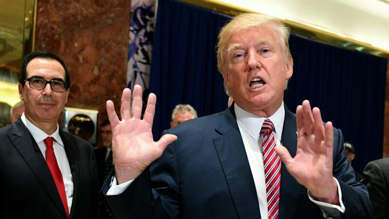 US President Donald Trump speaks to the press about protests in Charlottesville on Tuesday. Photograph: Jim Watson/AFP/Getty Images