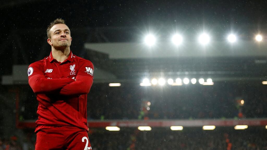 Liverpool’s Xherdan Shaqiri celebrates scoring his second goal at Anfield. Photograph: Reuters