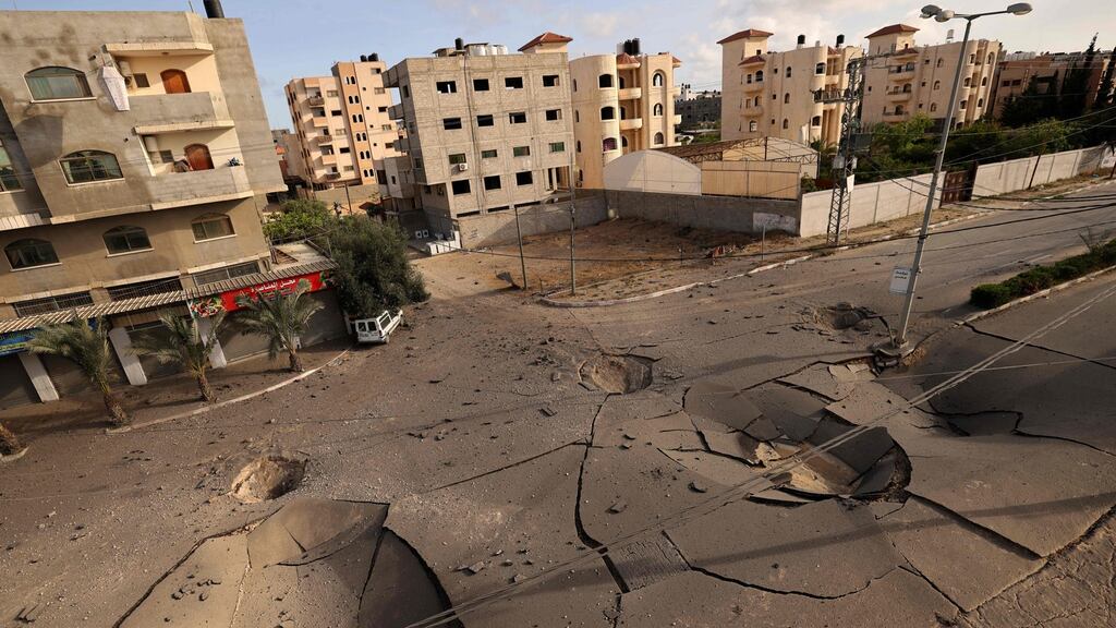 The heavily damaged Aqsa avenue in Gaza City’s Dahduh neighbourhood following an Israeli bombardment on Tuesday. Photograph: Mohammed Abed/AFP/Getty Images