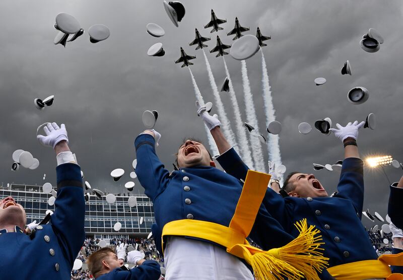 US Air Force Thunderbirds fly over as Air Force Academy cadets toss their caps in the air during a graduation ceremony in June in Colorado. Photograph: RJ Sangosti/MediaNews Group/The Denver Post via Getty Images