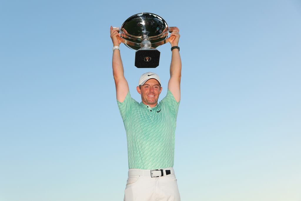 Rory McIlroy celebrates with the FedEx Cup. Photograph: Kevin C Cox/Getty Images)