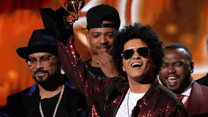 Bruno Mars accepts the Grammy for album of the year for ‘24K Magic’. Photograph: Lucas Jackson/Reuters