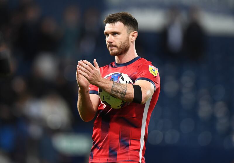 Scott Hogan of Birmingham City walks off with the match ball after his hat-trick against West Bromwich Albion earlier this week. Photograph: Tony Marshall/Getty Images