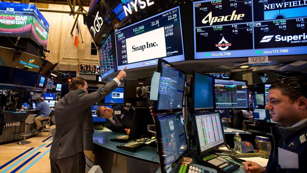 US stock indexes opened lower on Tuesday as investors paused after a recent record-breaking rally that helped the Dow notch up nine straight sessions of record close.  Photograp: Michael Nagle/Bloomberg