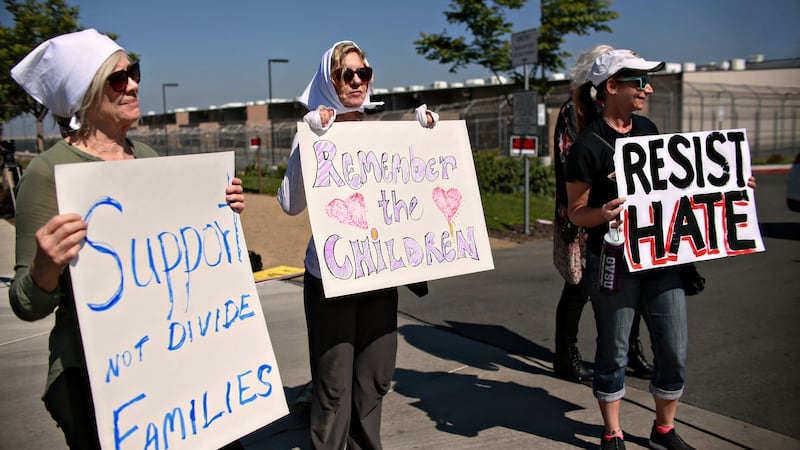 Protesters display signs while participating in a demonstration against immigration enforcement officials separating undocumented families at the Otay Mesa Detention facility in Otay Mesa, California on June 10th. Photograph: Sandy Huffaker/AFP