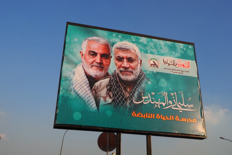 Top Iranian general Qasem Soleimani and Hashd commander Abu Mahdi al-Muhandis appear side by side on advertisement boards dotted around Baghdad, hailed as heroes slain in their prime. They were killed by a US drone attack in 2022. Photograph: Lorraine Mallinder