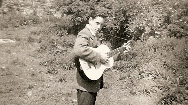Louis Stewart with his first guitar, bought from Waltons on Camden Street, Dublin, at the age of 14
