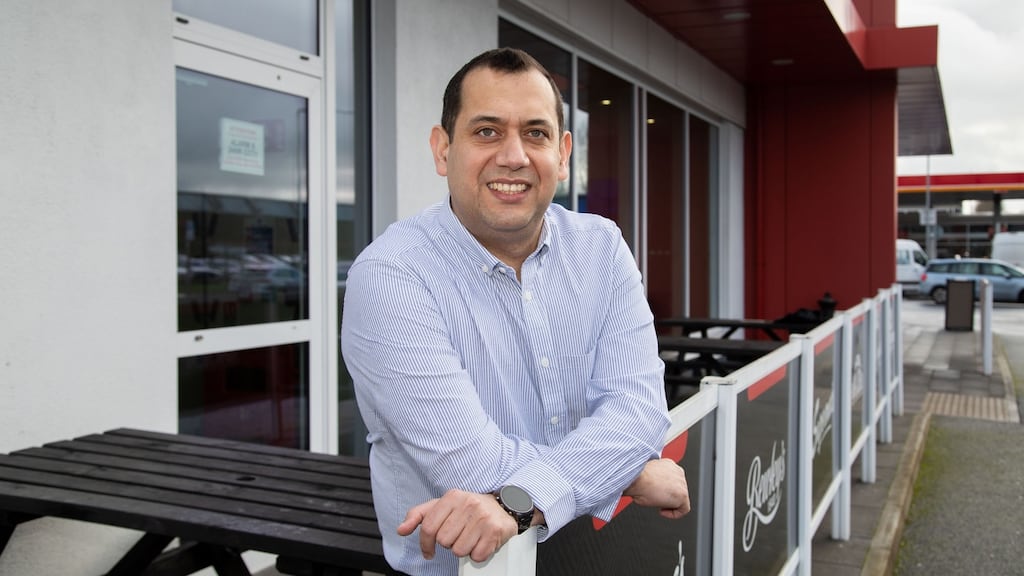 Sana Muhammad, who is originally from Pakistan and moved to Ireland in 2013, outside a Supermac’s, where he has risen through the ranks and now works as an area manager. Photograph: Alan Place