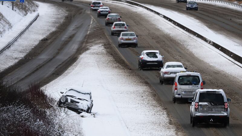 A crashed car on the M3 at Dunboyne, Co Meath, during the snowfall associated with Storm Emma. Photograph: Alan Betson
