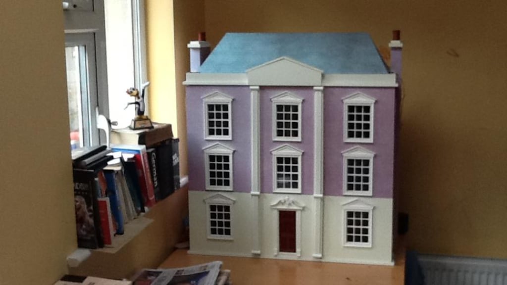 ‘In the meantime, I had bought a doll’s house for my daughter. And this decision, at least, must have been infected by the madness of the period. Because it was an enormous house: a neo-Georgian mansion, with three storeys and an attic, plus basement (for the servants, naturally)’.