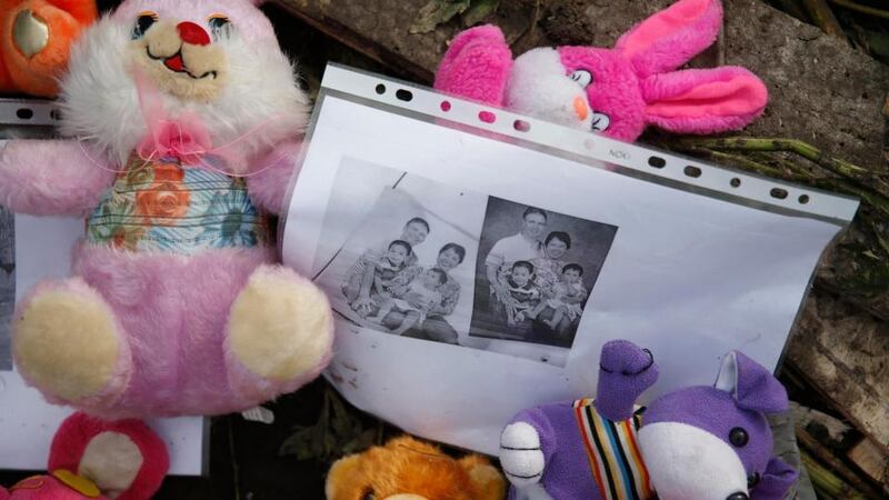 Mementos placed at the crash site of Malaysia Airlines Flight MH17 are pictured near the settlement of Rozspyne in the Donetsk region. Ukraine has accused Russia and pro-Moscow rebels of destroying evidence to cover up their guilt in the shooting down of the Malaysian airliner.  Photograph: Maxim Zmeyev/Photograph