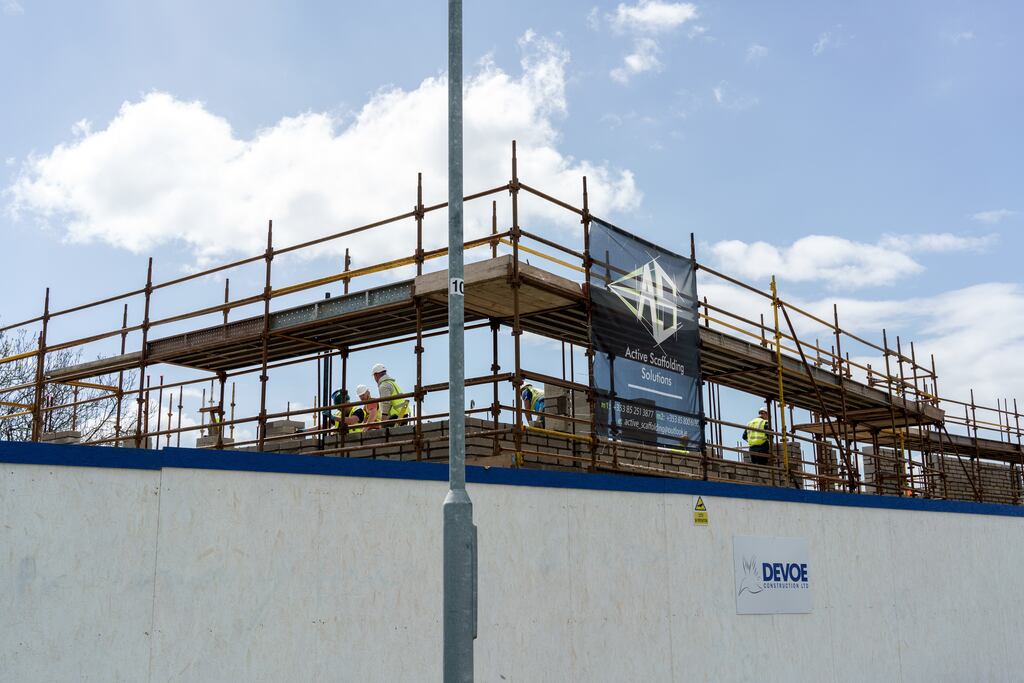 Builders working in Bay Meadows, a housing estate under construction, in west Dublin, Ireland, on Tuesday, May 11, 2021. The mass purchase of affordable houses  on the market for about 400,000 euros ($490,000)  set off a public firestorm and highlights the growing tension over the squeeze in urban housing and the role of large investors. Photographer: Paulo Nunes dos Santos/Bloomberg