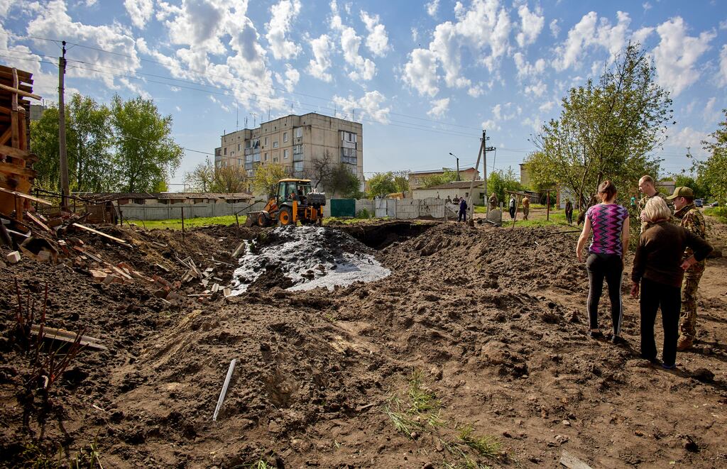Workers fix damaged piping in the aftermath of a rocket attack in the Zolochiv settlement of the Kharkiv's area, Ukraine, 14 May 2023. Russian troops carried out S-300 missile strikes on Kharkiv and the Zolochiv settlement in the Kharkiv district on the night between 13 and 14 May. Some buildings and a transport infrastructure were damaged, the head of the Kharkiv Regional Civil-Military Administration Oleg Synegubov announced on 14 May. No victims were reported.