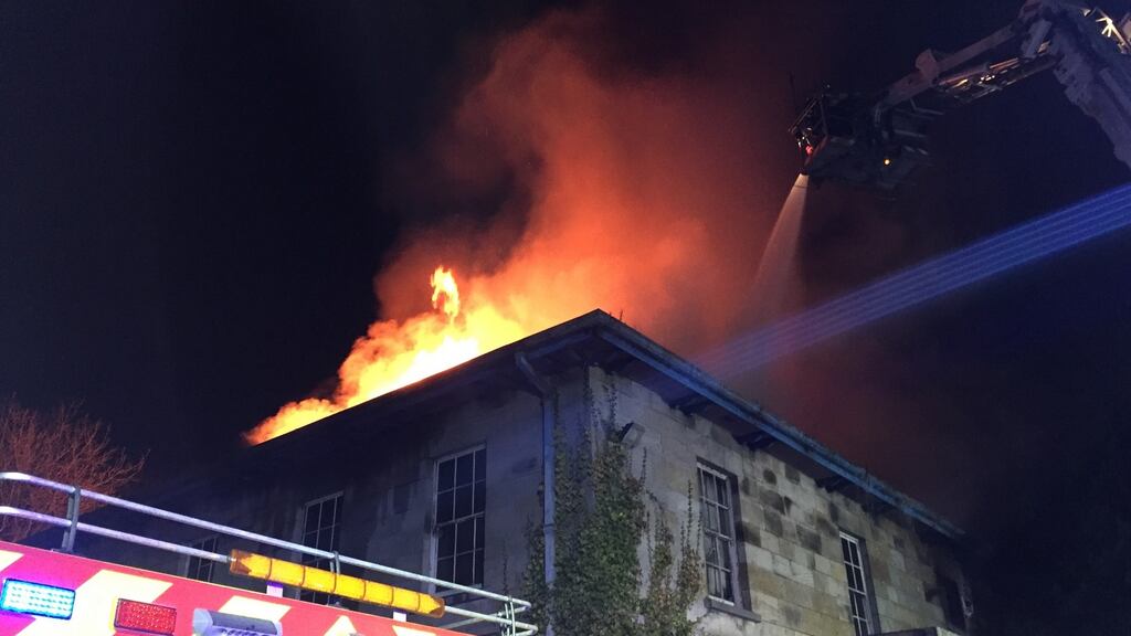 Firefighters quell the fire engulfing Kilmoyle House in Co Limerick in the early hours of Friday