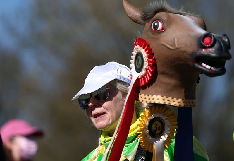 An animal rights protester outside Aintree Racecourse ahead of the 2023 Grand National event on Saturday. Photograph: Adam Vaughan/EPA