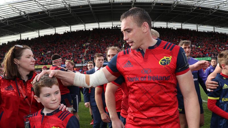 Munster’s Tommy O’Donnell with Dan Foley, son of the late Anthony Foley, during the Champions Cup game against Glasgow Warriors at Thomond Park in October 2016. Photograph: Dan Sheridan/Inpho