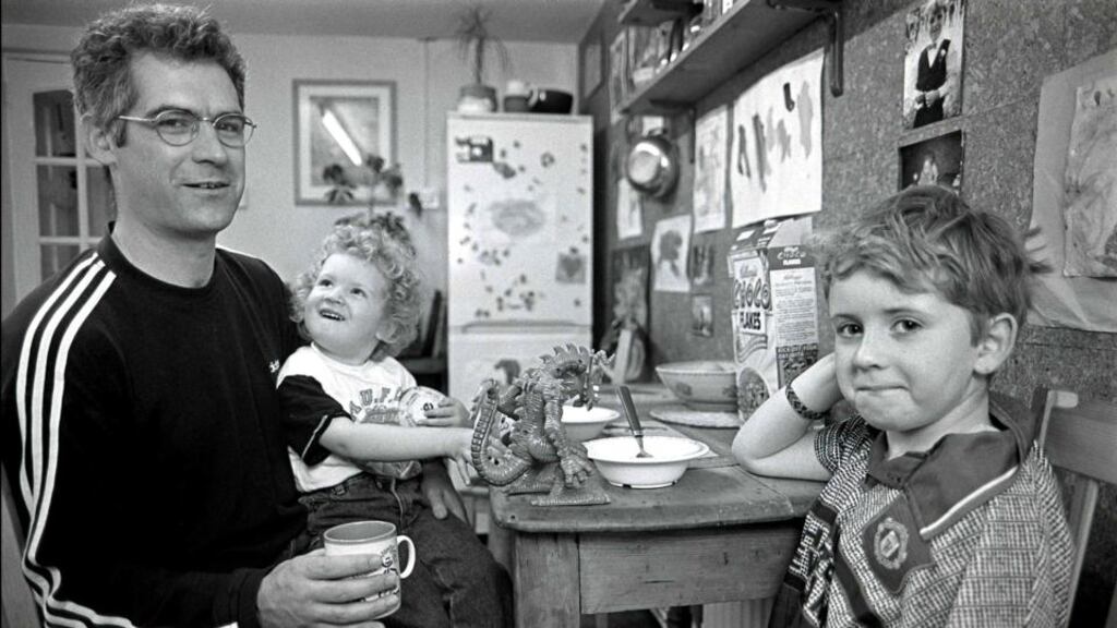 Kevin Webster at home in Dolphin’s Barn, Dublin, in 1995 with his sons Naoise McTeirnan and Finbarr McTeirnan. Photograph: Derek Speirs