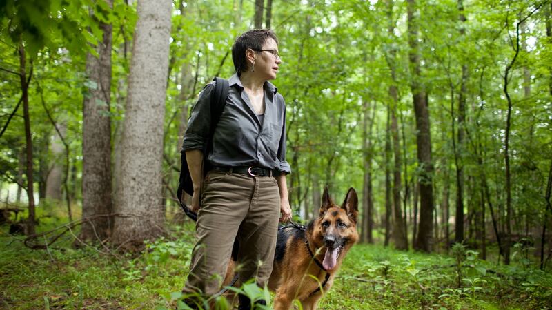 Prof Cat Warren with her cadaver dog, Solo: Use of dogs in murder investigations really began in the 1970s after the US army used them to track Viet Cong forces in the Vietnam war.