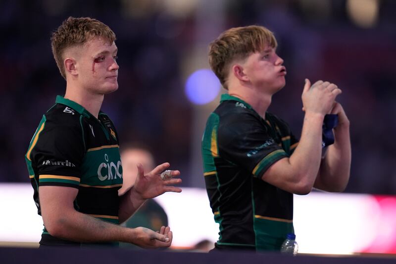 Northampton Saints' Fin Smith (left) and Henry Pollock after the game. Photograph: Andrew Matthews/PA