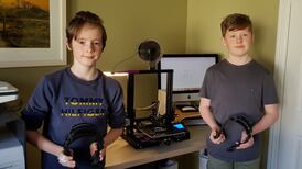Two schoolboys from Celbridge produce face masks for frontline staff