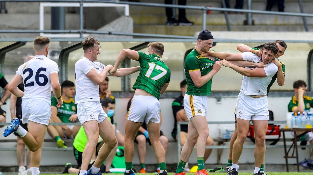 Tempers flare between the Meath and Kildare teams near the end of the game. Photograph: Lorraine O’Sullivan/Inpho