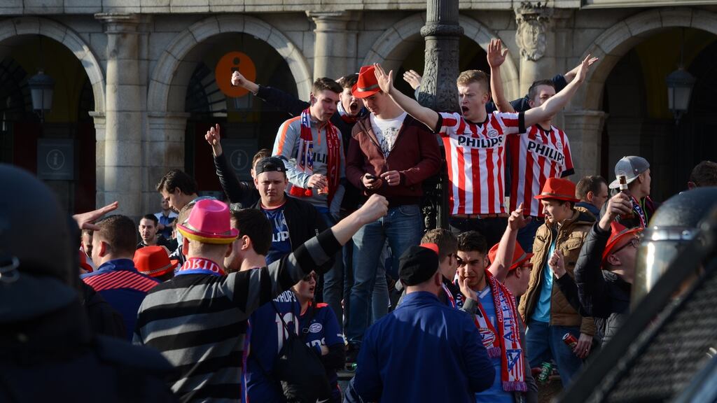 PSV supporters in Madrid for their team’s Champions League tie. Photograph: Getty Images