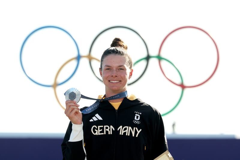 Esther Henseleit of Team Germany with her silver medal from the women's individual stroke play event at the Olympic Games in Paris. Photograph: Kevin C Cox/Getty